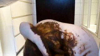 Sexy milf taking big fat dildo in her asshole