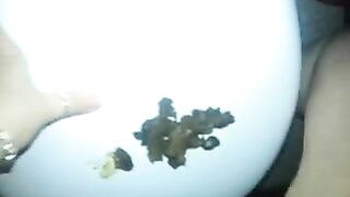 Sexy chick smearing shit