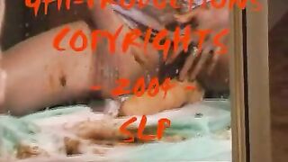 Busty lady smearing and masturbating with dildo