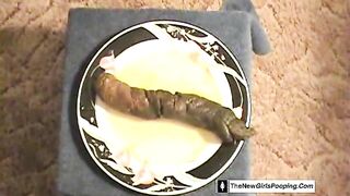 Dropping green hard turd on the plate