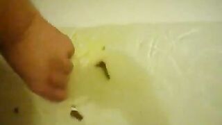Fat woman shits and plays with pussy in bath