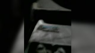 shitting on newspaper in the dark