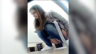 Sweet blonde girl dropping hard load on the floor