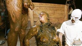 Betty gets peed on while being covered in cow dung