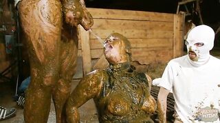 Betty gets peed on while being covered in cow dung