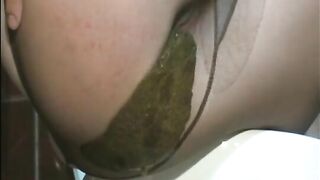 Blonde milf shitting pantyhose