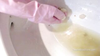 Digging through shitty clogged toilet