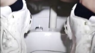 Girl is doing a big squirt of diarrhea in toilet