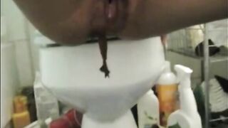Dirty girl shitting on dildo