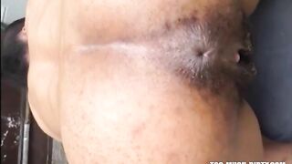 Hairy woman shitting doggystyle closeup