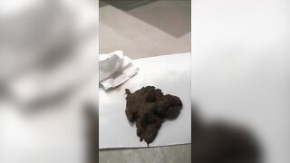 Hot babe in high heels shitting in the tub