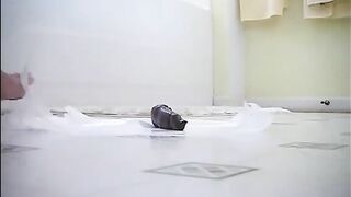 Tasty milf shitting on the bathroom floor