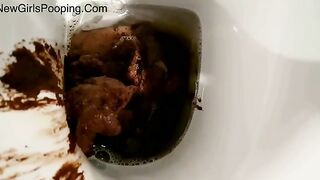 Huge turd really stretches her asshole wide