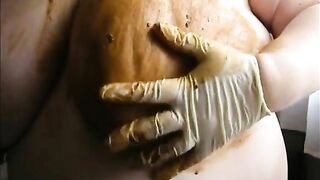 Woman squeezes out a big shit with her ass