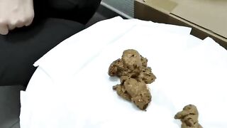 Cute blonde girl smearing shit on her tits