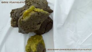 Stunning babe showing her smooth ass and poop