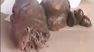 Mature busty lady pooping at home