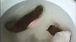 Tattooed ass mature lady pooping