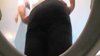 Filling her purse with shit