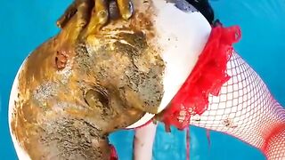 Smearing shit on her ass