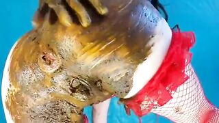 Smearing shit on her ass