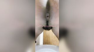 Yummy closeup of pooping gal