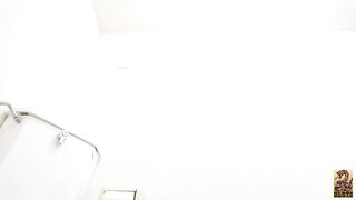 Girl takes a big shit over the toilet, doesn't flush.