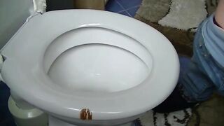 Cute shy gal shitting