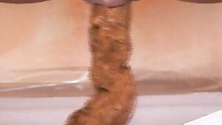 MILF in lingerie shitting nicely