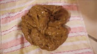 Girl takes a shit on a baby blanket