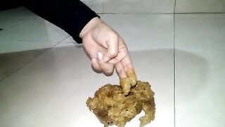 Chubby ass girl takes legs in the air while pooping