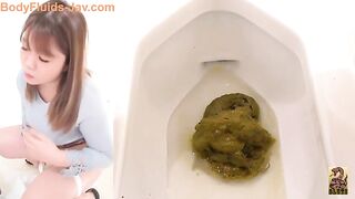 Young beautiful Japanese chick caught pooping