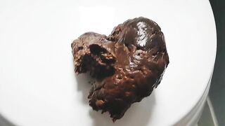 Cute round pale ass babe shitting