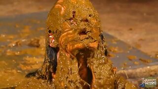 Pretty brunette chick playing with her pussy in manure