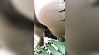 Birthing a big shit in back yard