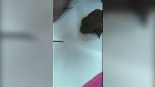 Shaved horny brunette gal fingering and pooping