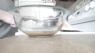 Mature lady filling the bowl