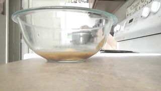 Mature lady filling the bowl