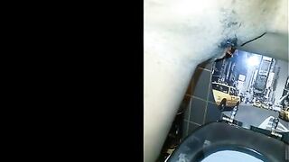 Dropping hard turds into the toilet bowl