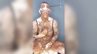 Dirty mature lady smearing shit on her body