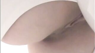 Girl shitting a lot in the toilet