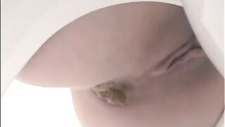 Girl shitting a lot in the toilet